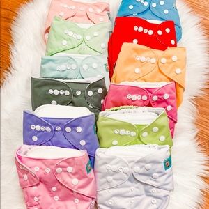 12 never used Alva Baby cloth diapers